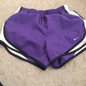 Purple Nike shorts